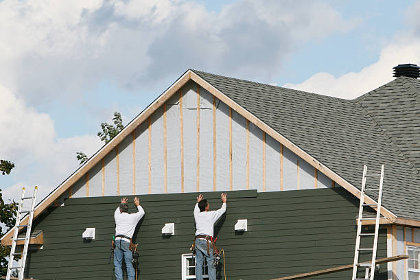 Professional Siding Replacement technician working in Albertson, NY